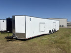 This Rock Solid Cargo trailer is set up with triple 7,000 lb torsion axles, spread axle configuration, E-Track, escape doors, D-rings, and more — a great setup for hauling cars, race vehicles, equipment, and more!