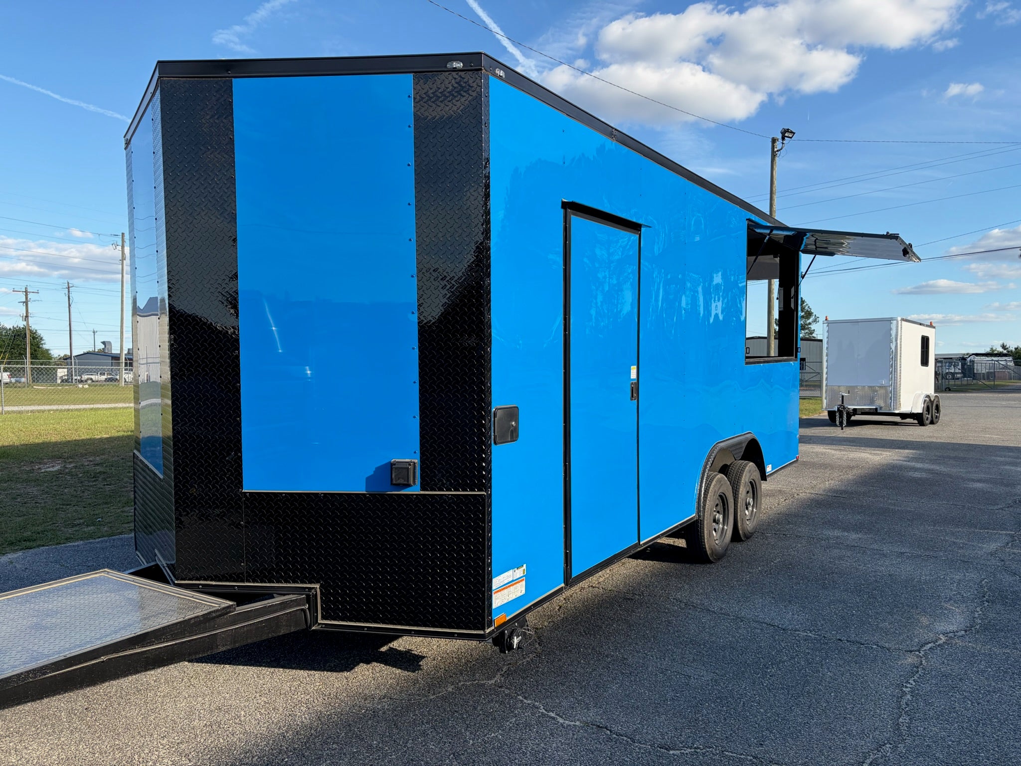 8.5X20TA Blue Concession Gullwing Porch Trailer