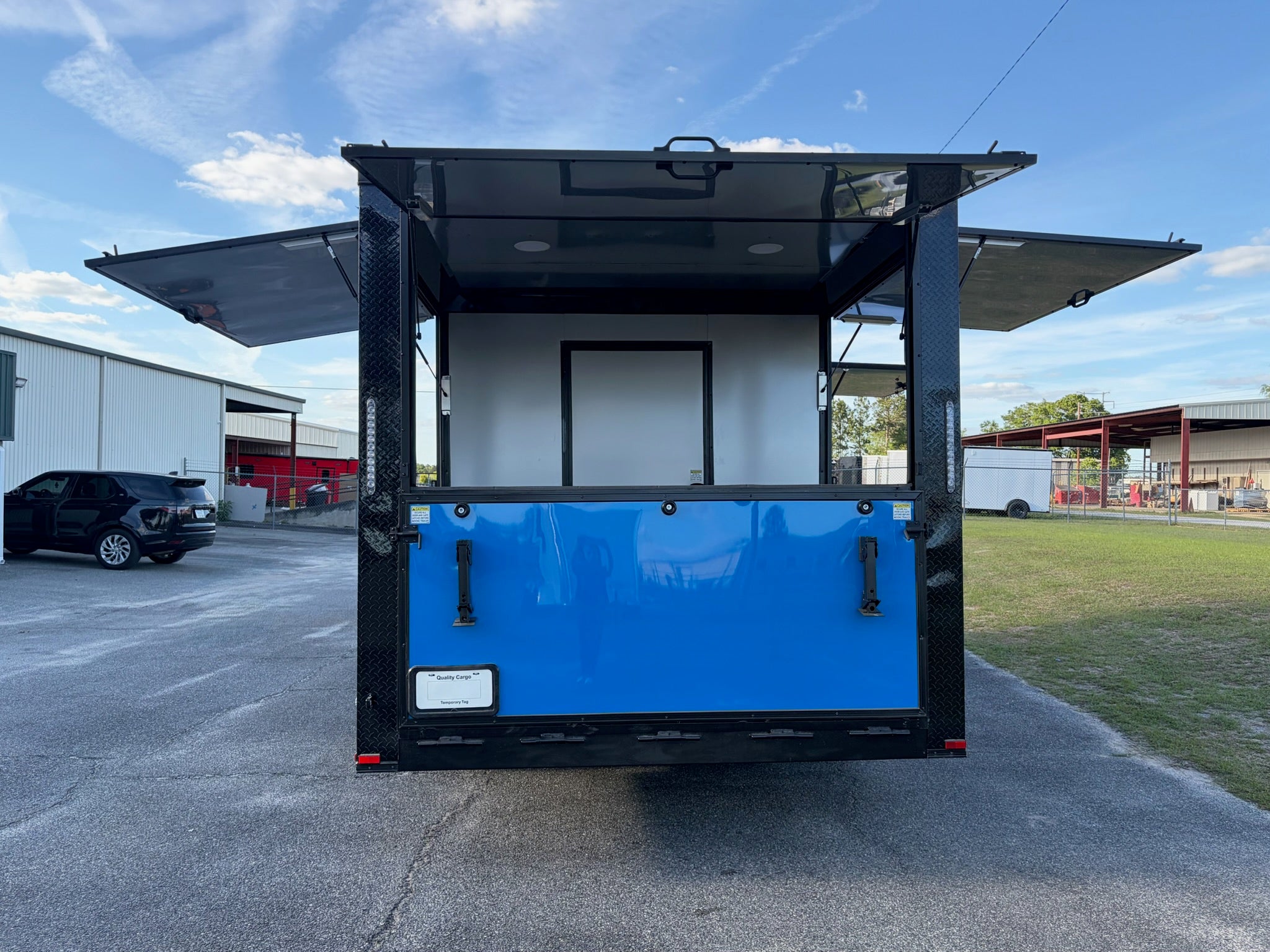 8.5X20TA Blue Concession Gullwing Porch Trailer