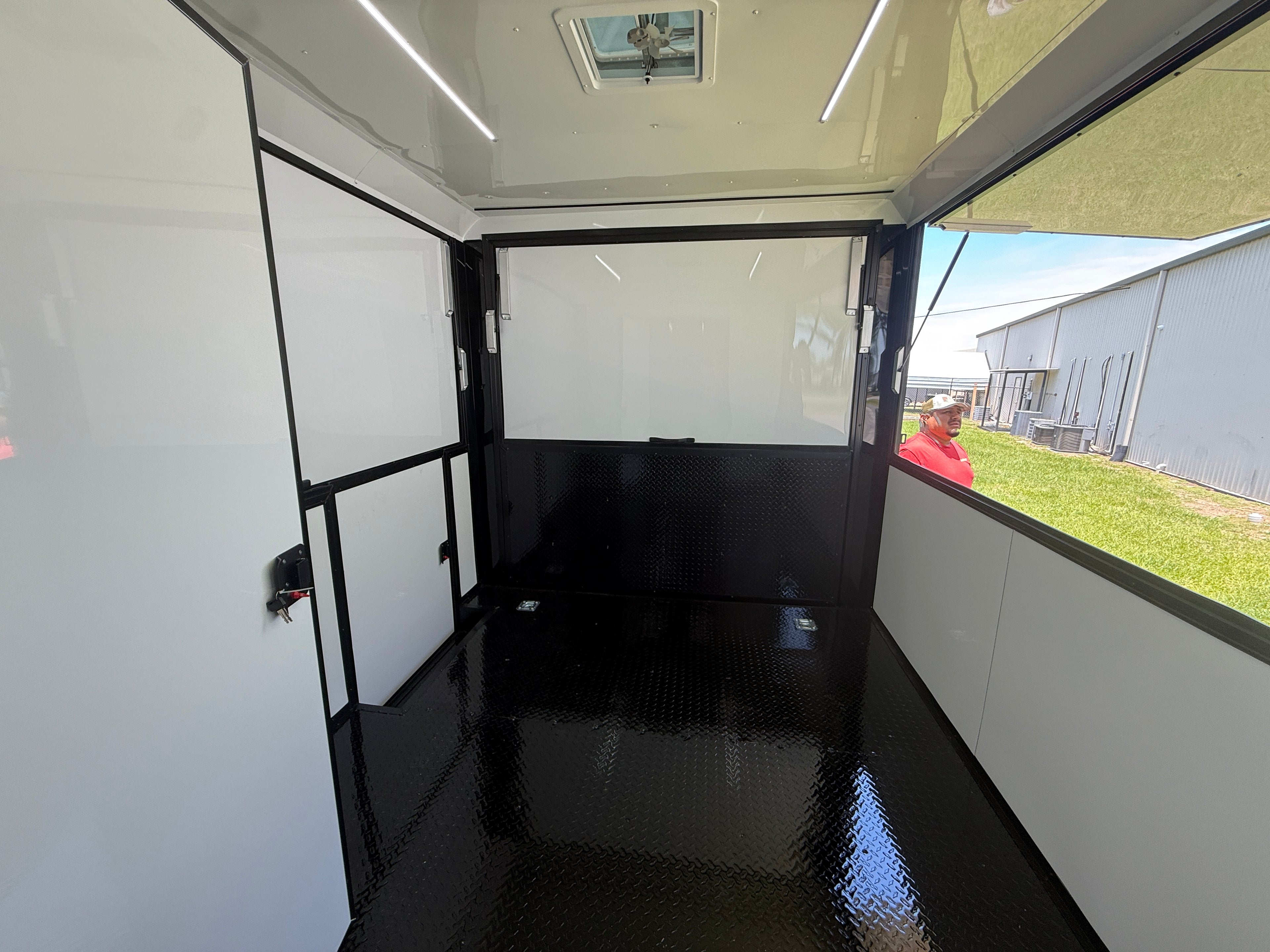 8.5X30TA White Concession Gullwing Porch Trailer
