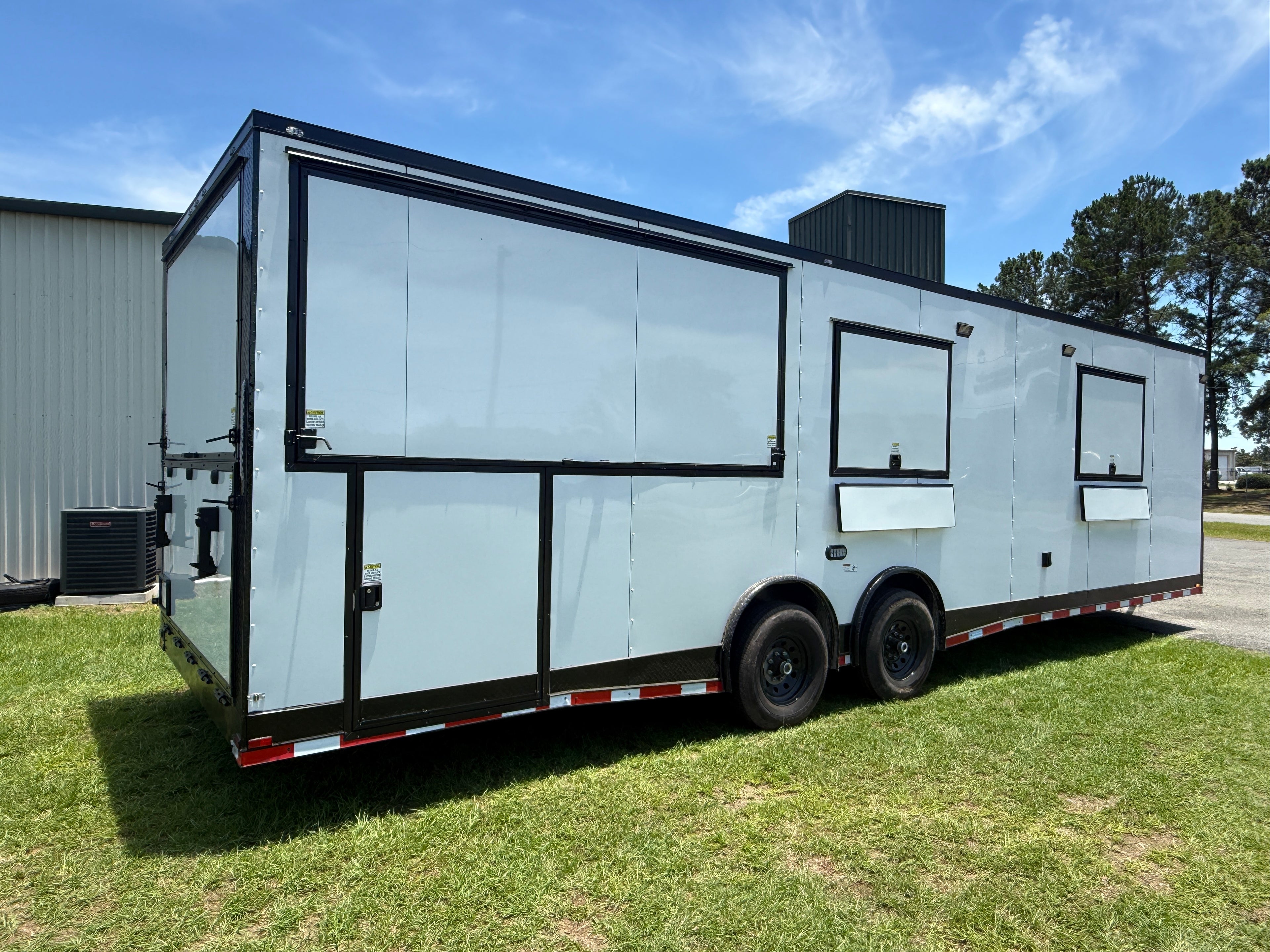8.5X30TA White Concession Gullwing Porch Trailer