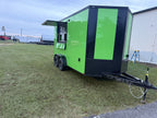 Stand out with this Electric Green concession trailer featuring a blackout package, lime green cabinets, checkered flooring, and a spacious prep area. Its serving window, counters, sink package, and A/C provide a versatile setup for a coffee, beverage, dessert, or concession business.