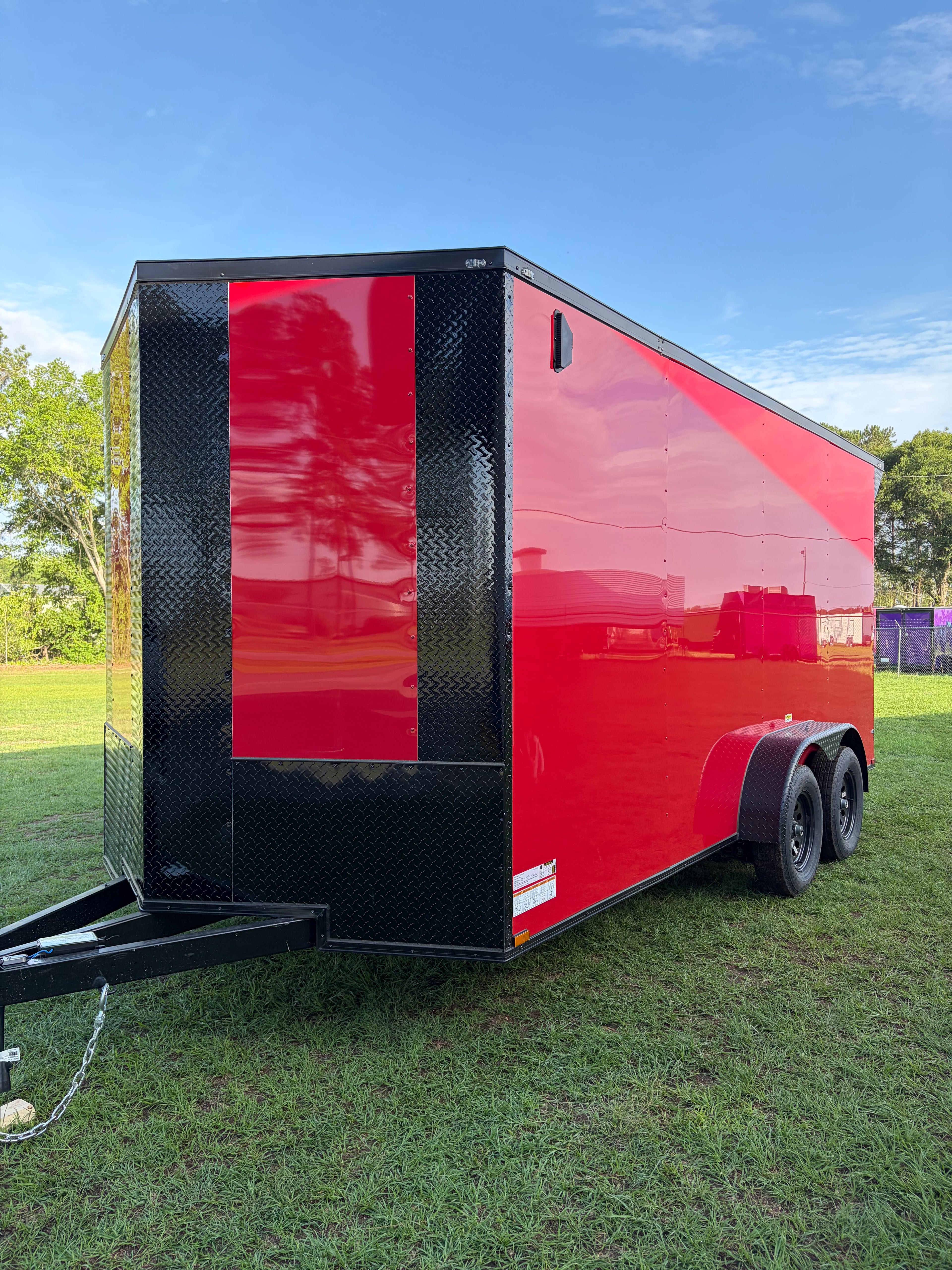 Red 2026 Titanium 7x16 enclosed cargo trailer