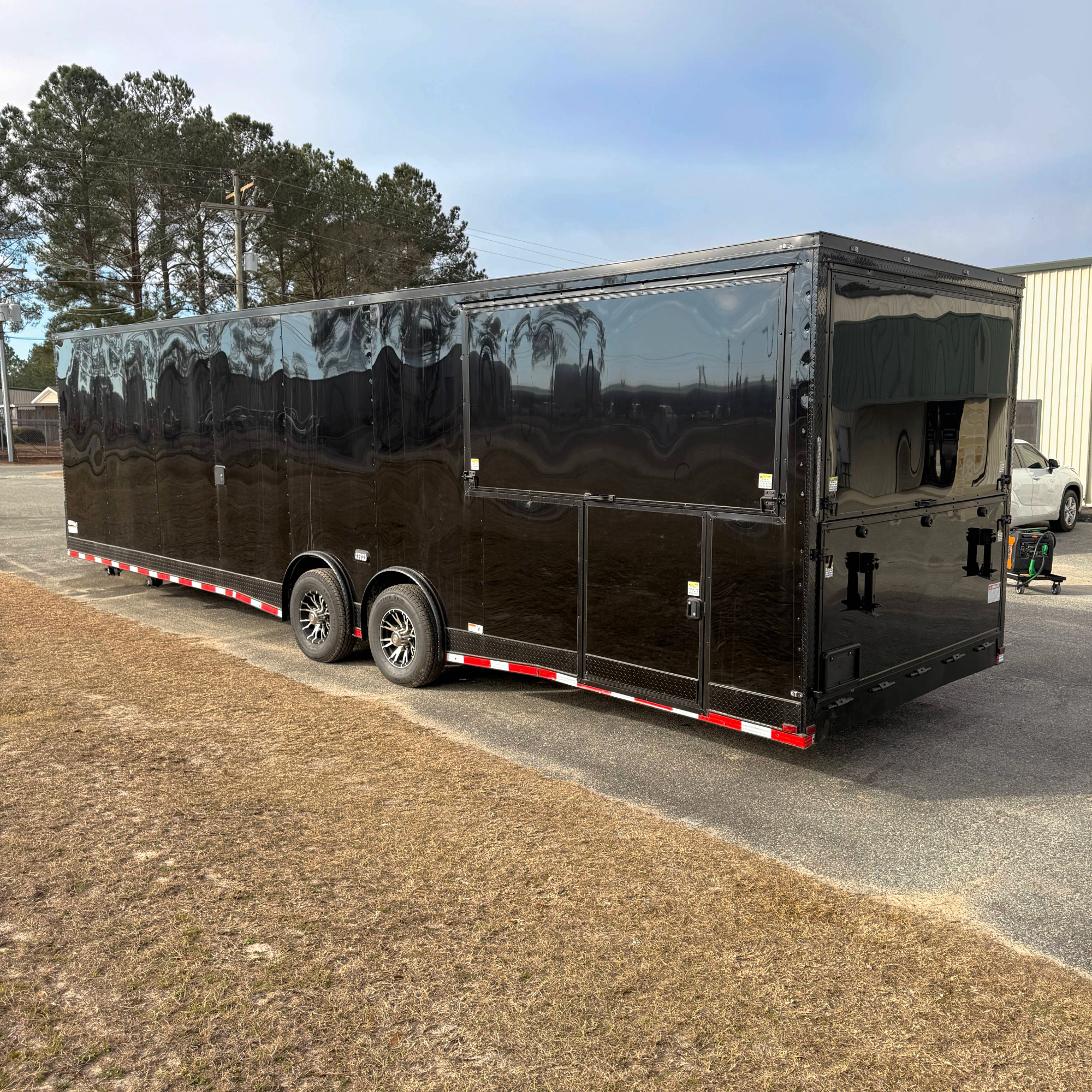 8.5X32TA5 Black Gullwing Porch Trailer