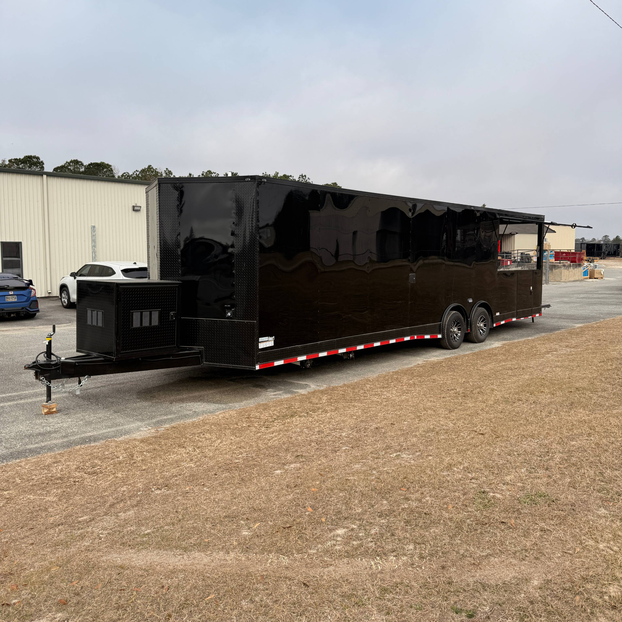 8.5X32TA5 Black Gullwing Porch Trailer