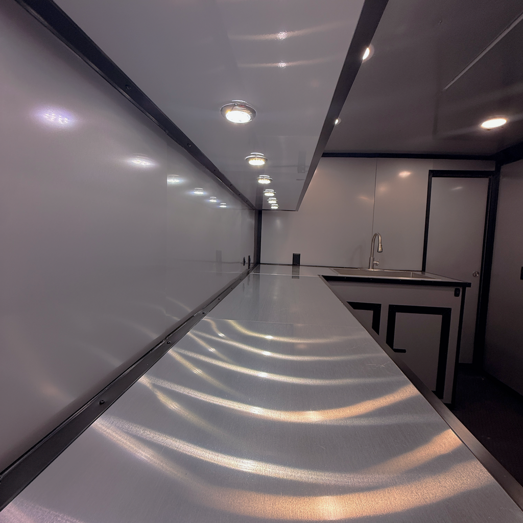 8.5X32TA5 Black Gullwing Porch Trailer